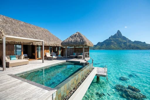 Overwater bungalow with turquoise lagoon